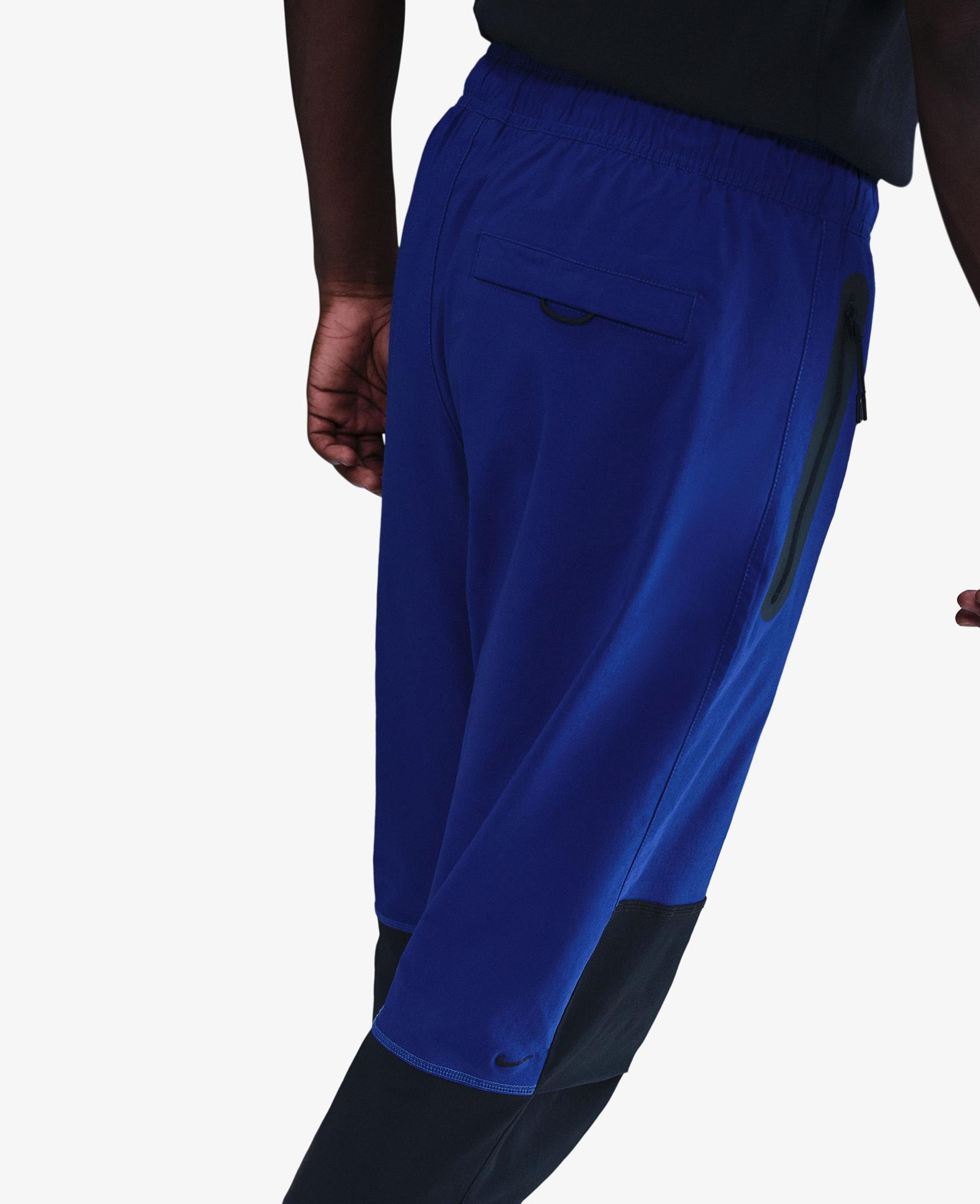 Nike Dri-Fit Tech Woven Erkek Mavi Eşofman Altı