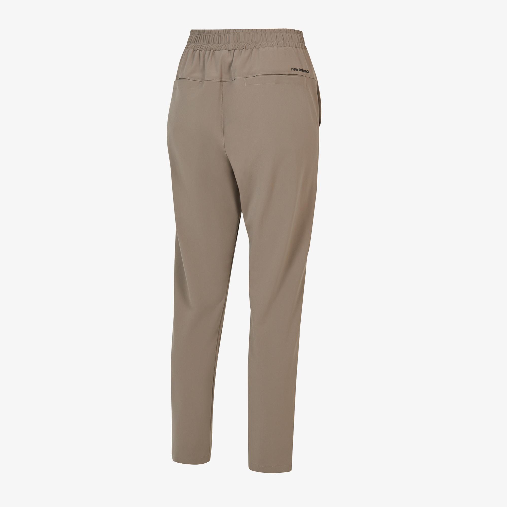 New Balance MNP3433 Lifestyle Erkek Bej Eşofman Altı