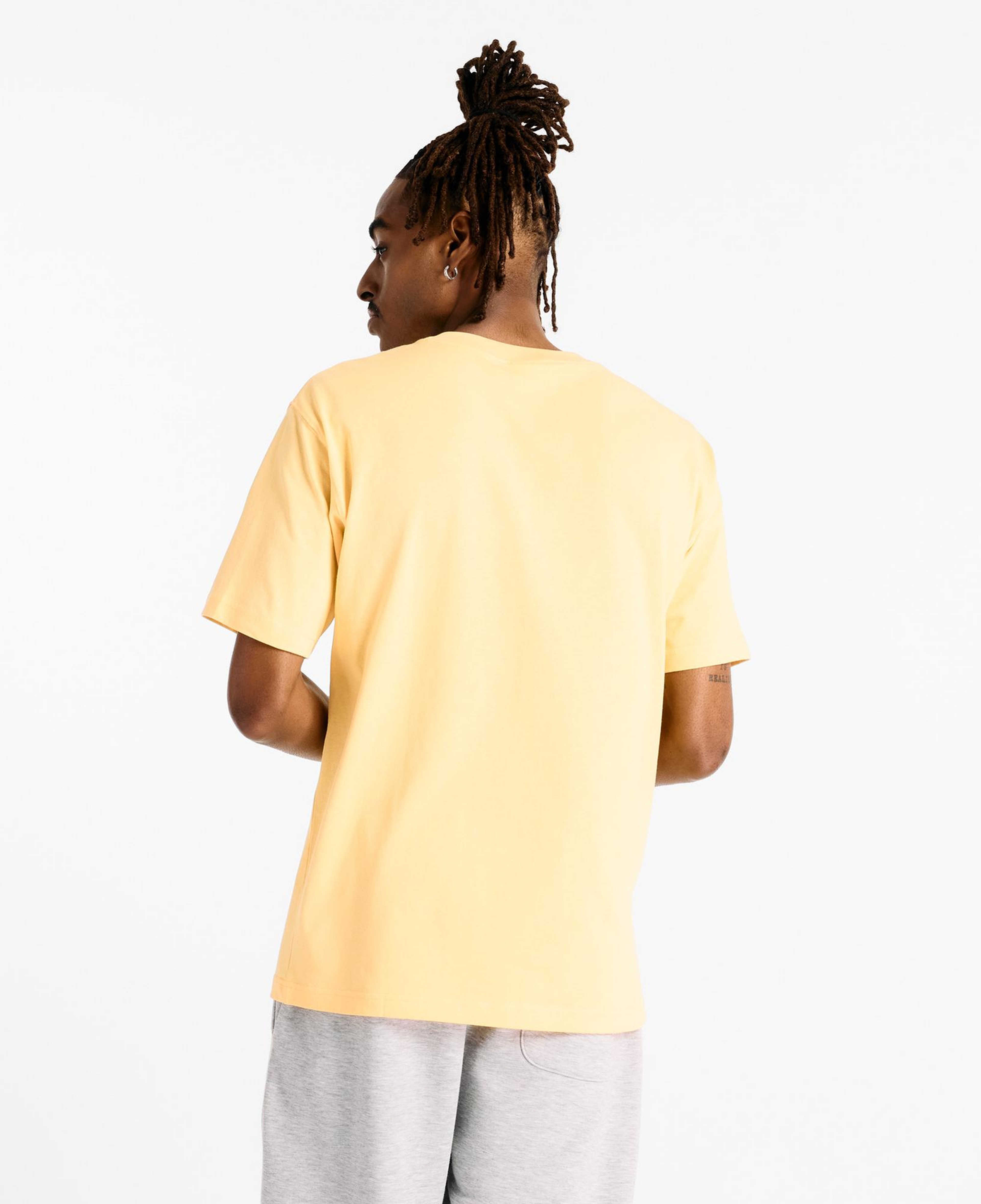 New Balance Athletics Logo Erkek Sarı T-Shirt