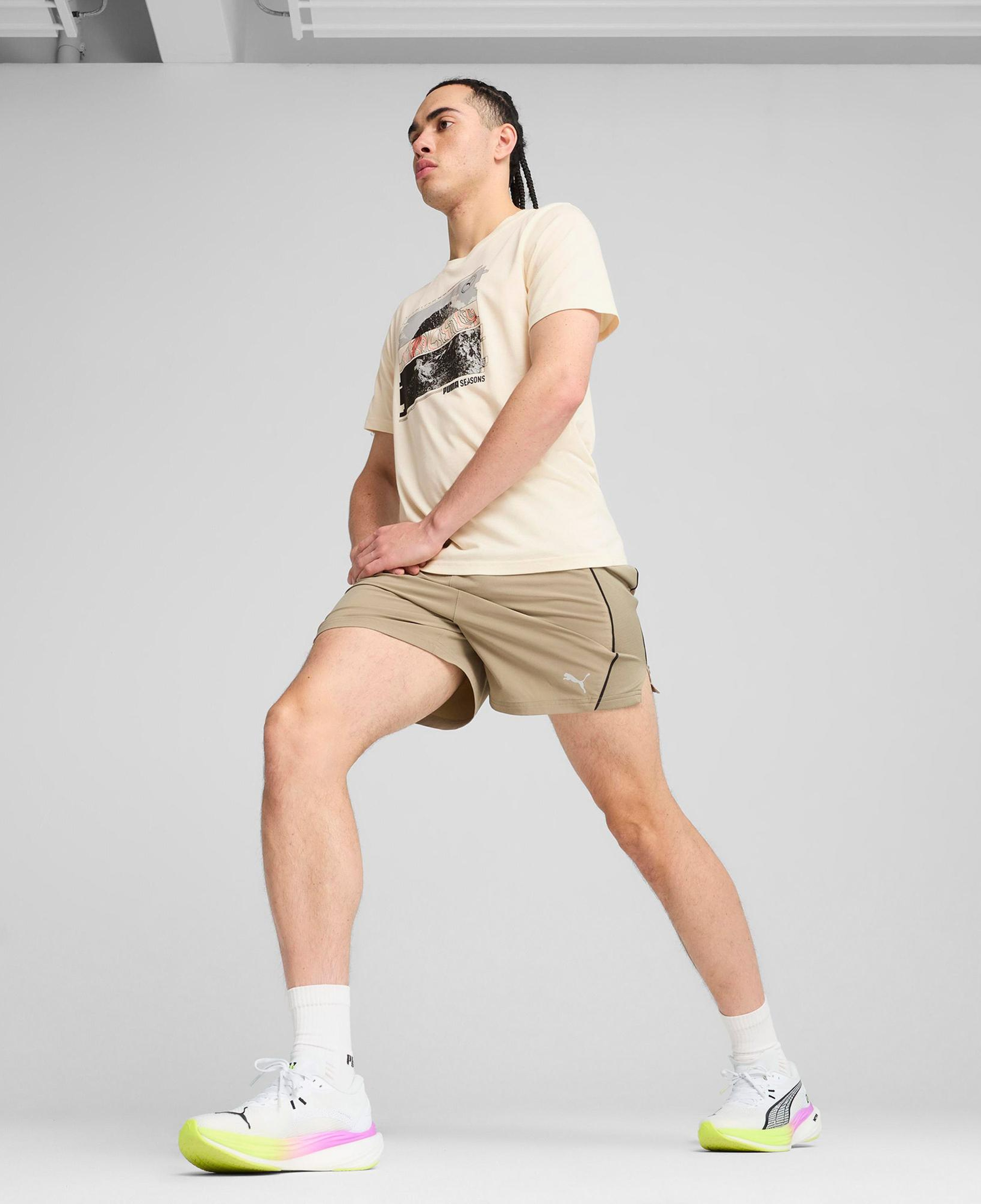 Puma Graphics Seasons Erkek Krem T-Shirt