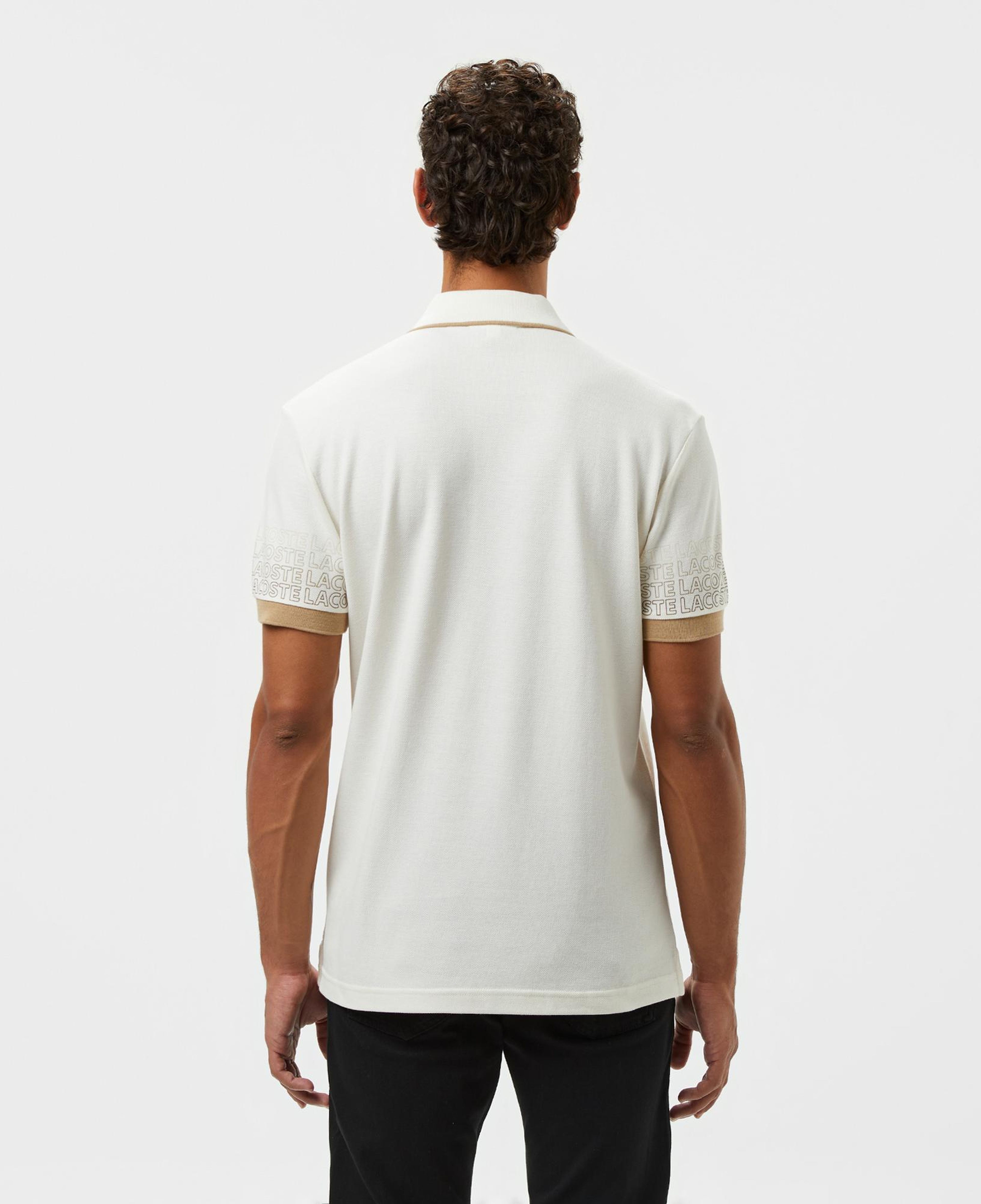 Lacoste Loose Fit Erkek Baskılı Beyaz Polo