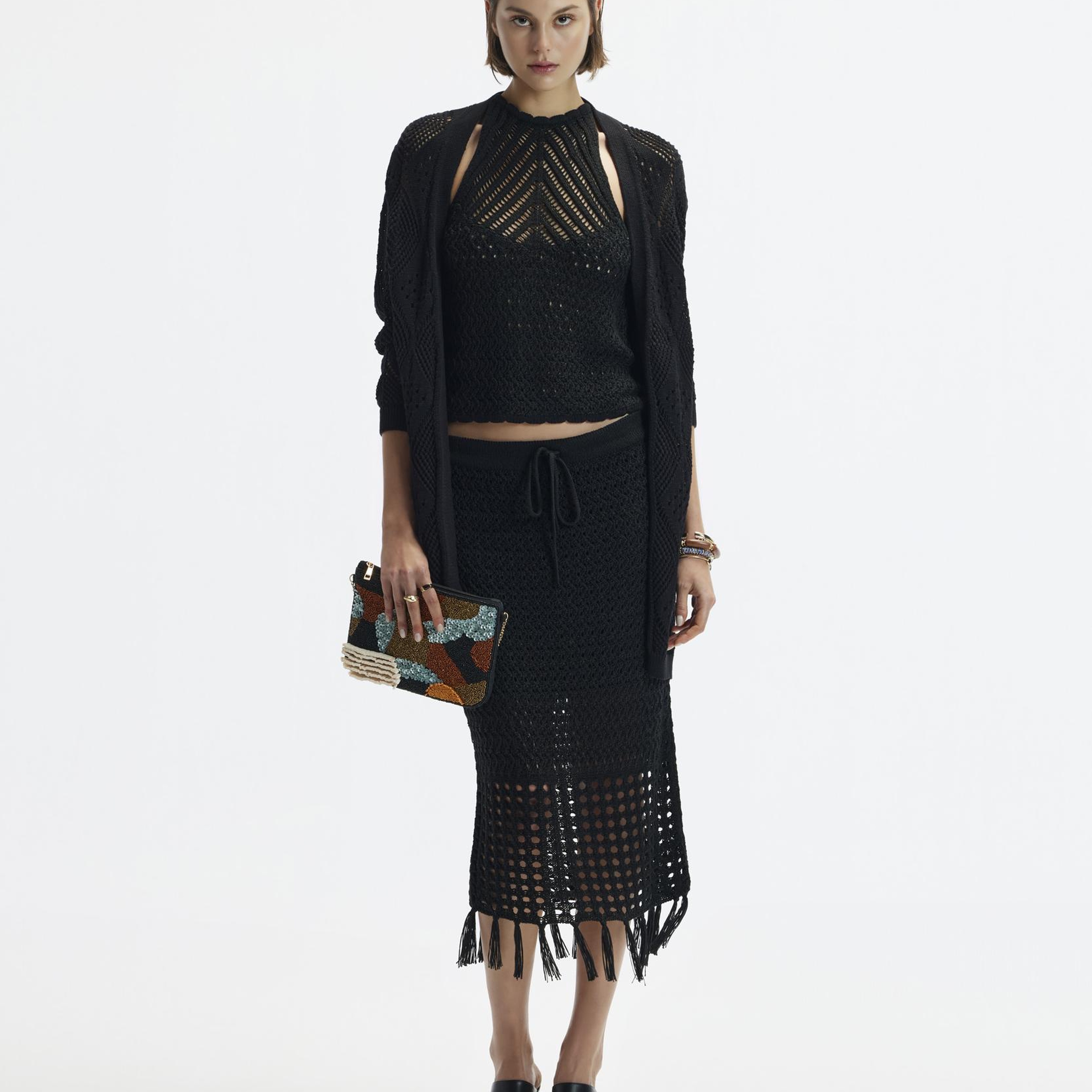 YARGICI Püsküllü Dizaltı Triko Etek