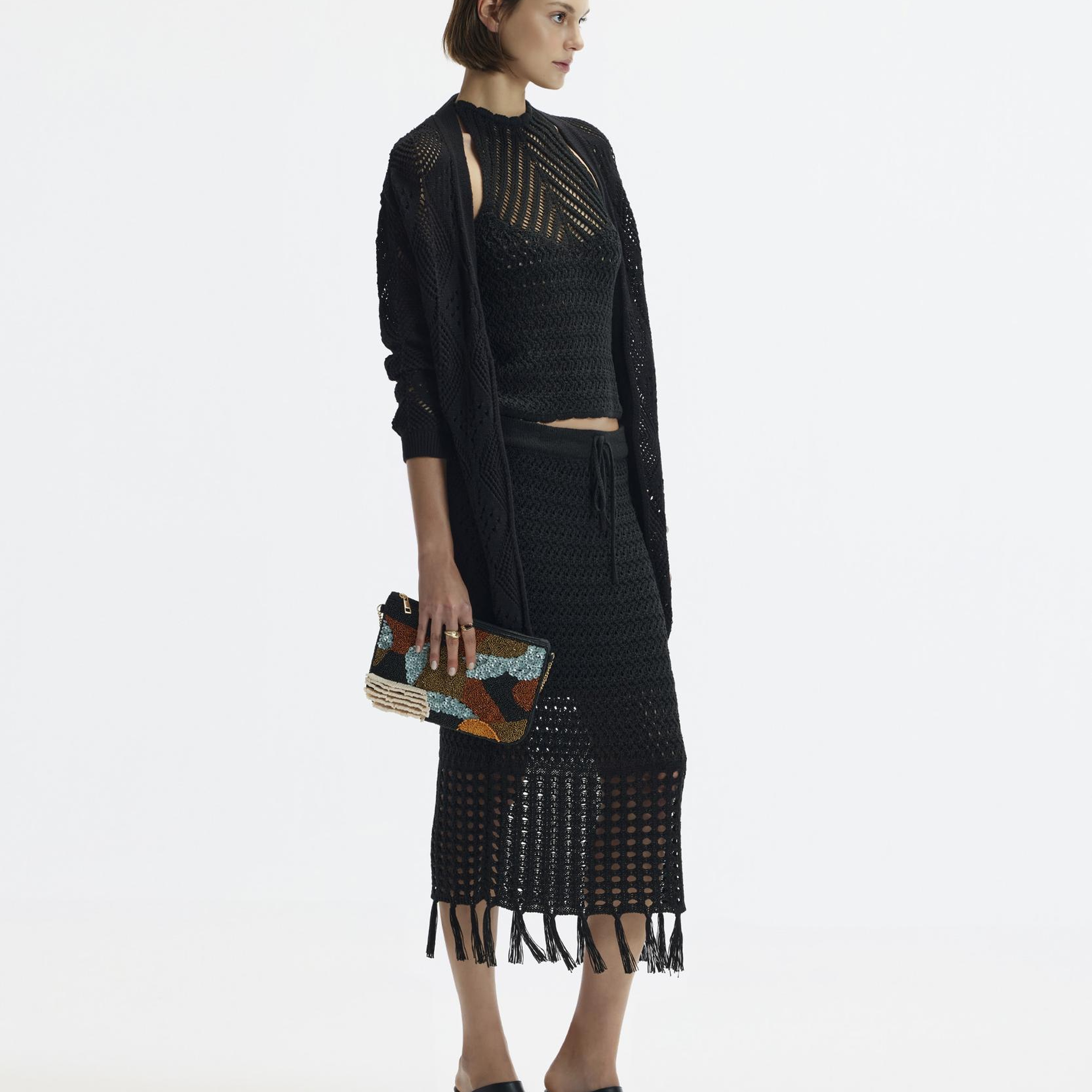 YARGICI Püsküllü Dizaltı Triko Etek