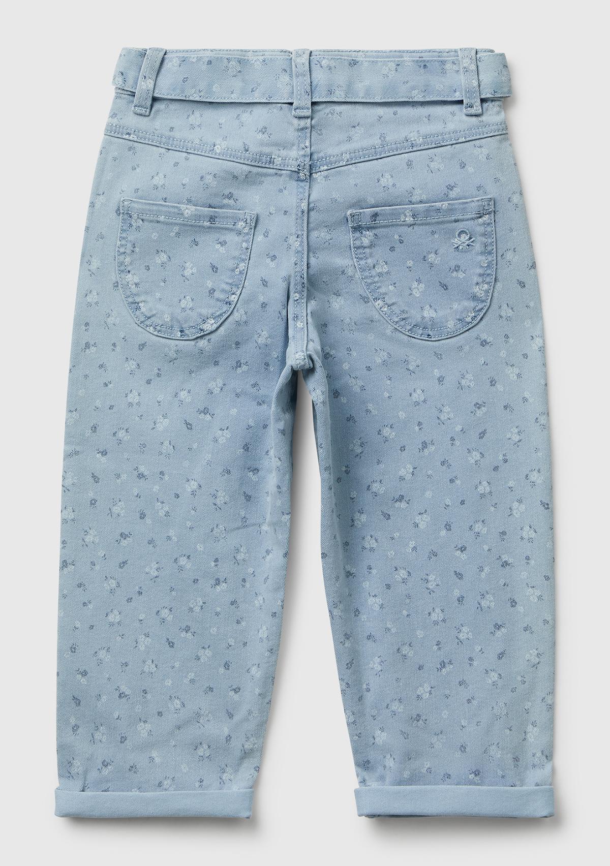 Kız Çocuk Açık Mavi Çiçek Desenli Beli Bağlamalı Paçası Kıvrık Denim Pantolon