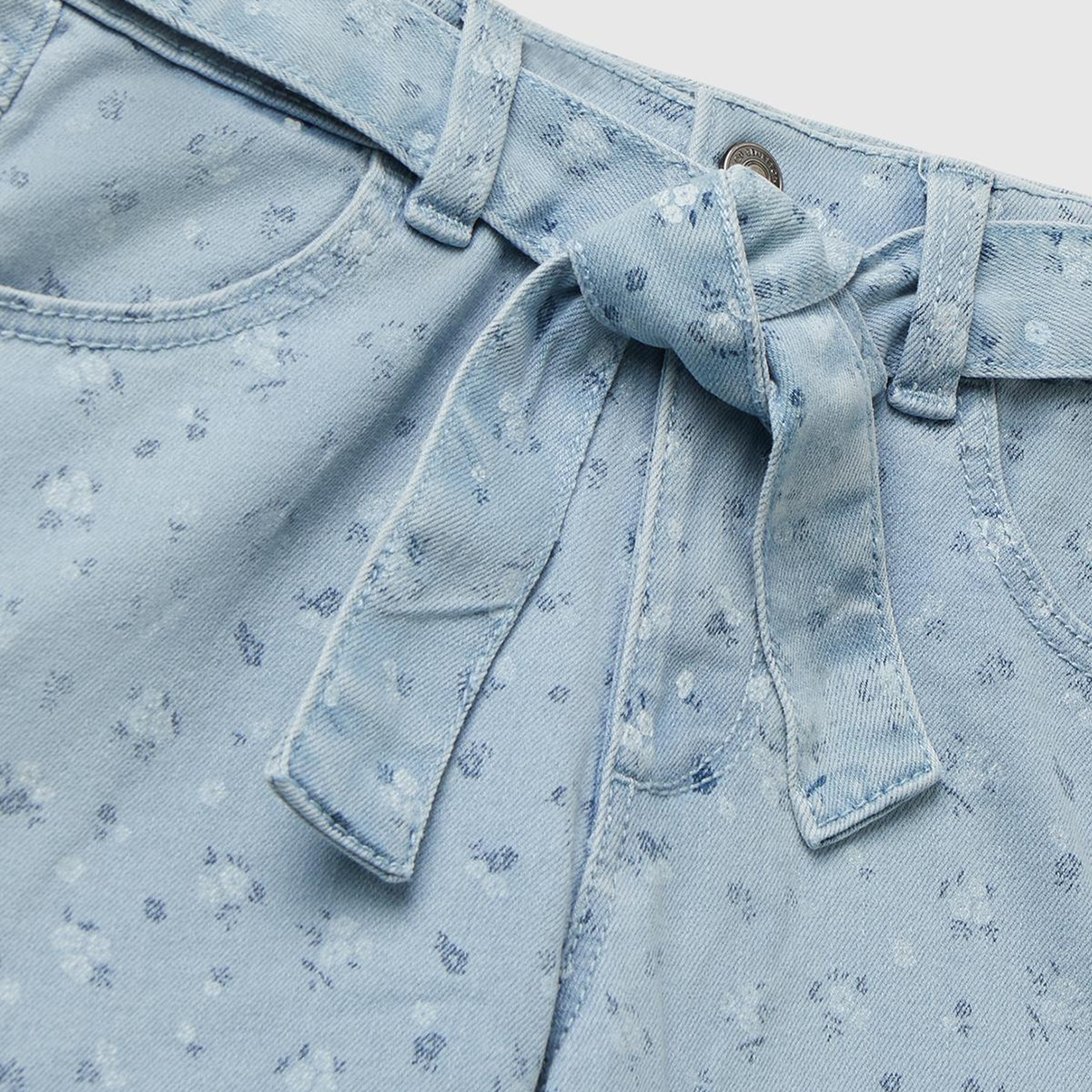 Kız Çocuk Açık Mavi Çiçek Desenli Beli Bağlamalı Paçası Kıvrık Denim Pantolon