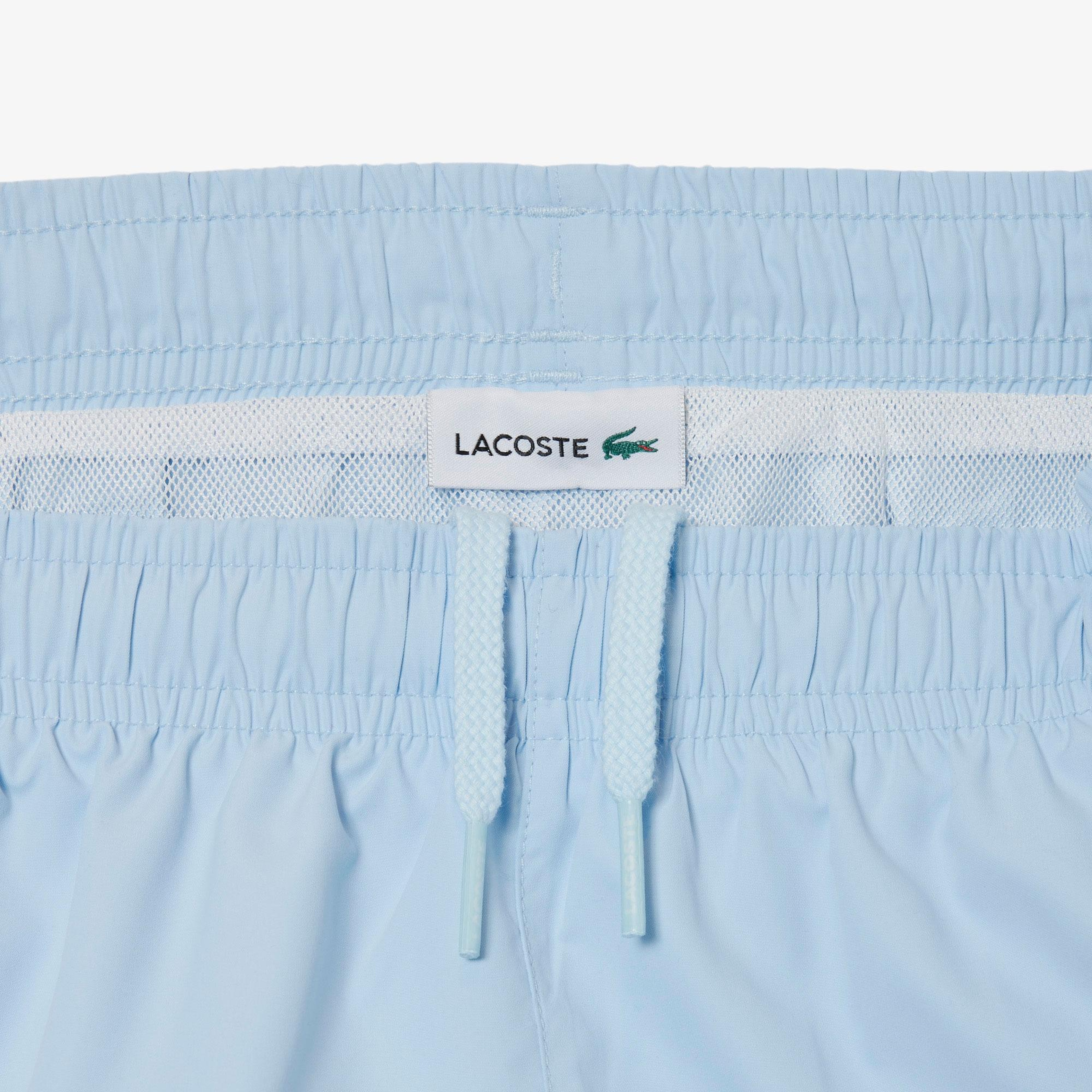 Lacoste Erkek Çocuk Renk Bloklu Mavi Deniz Şortu