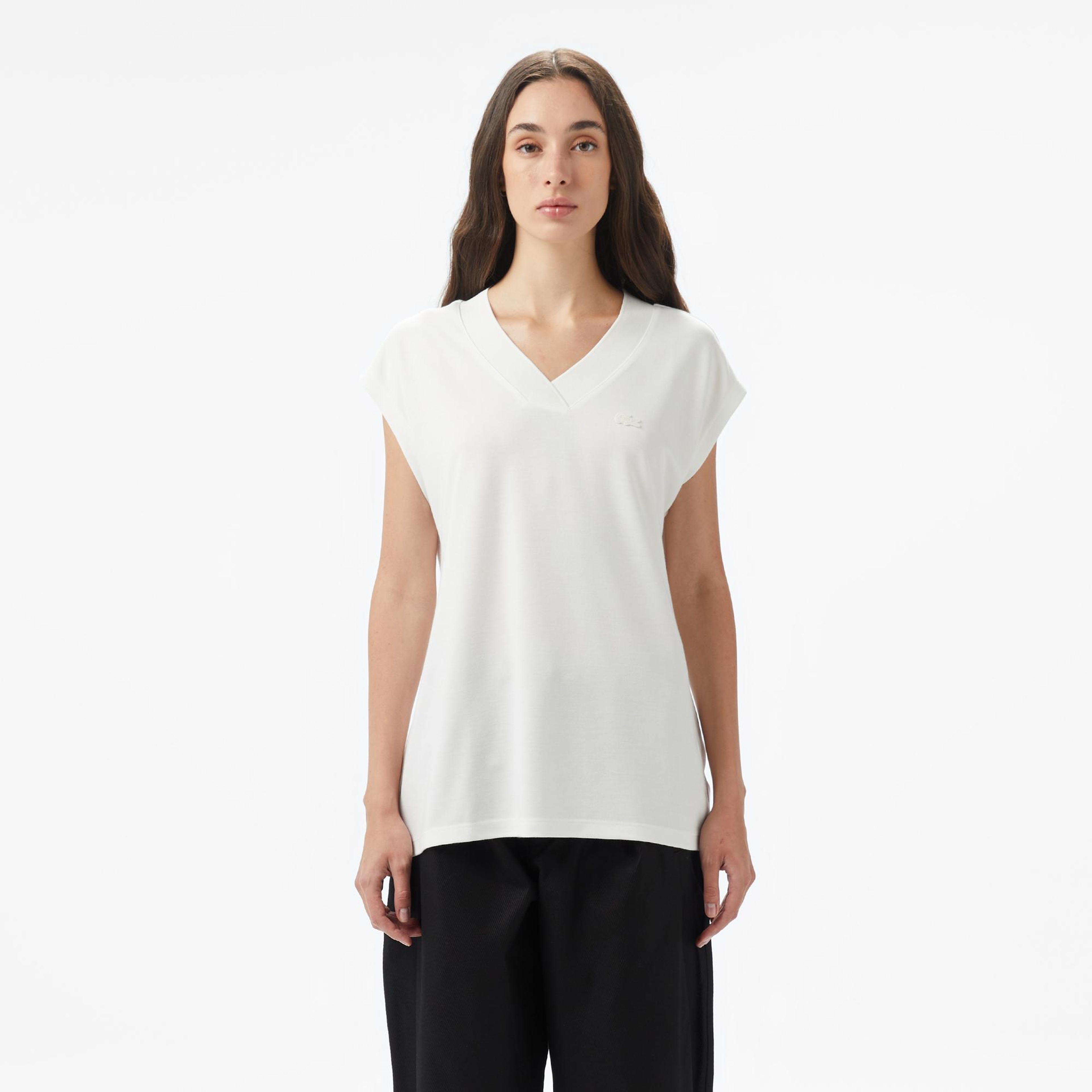 Kadın Slim Fit Kolsuz V Yaka Krem Bluz