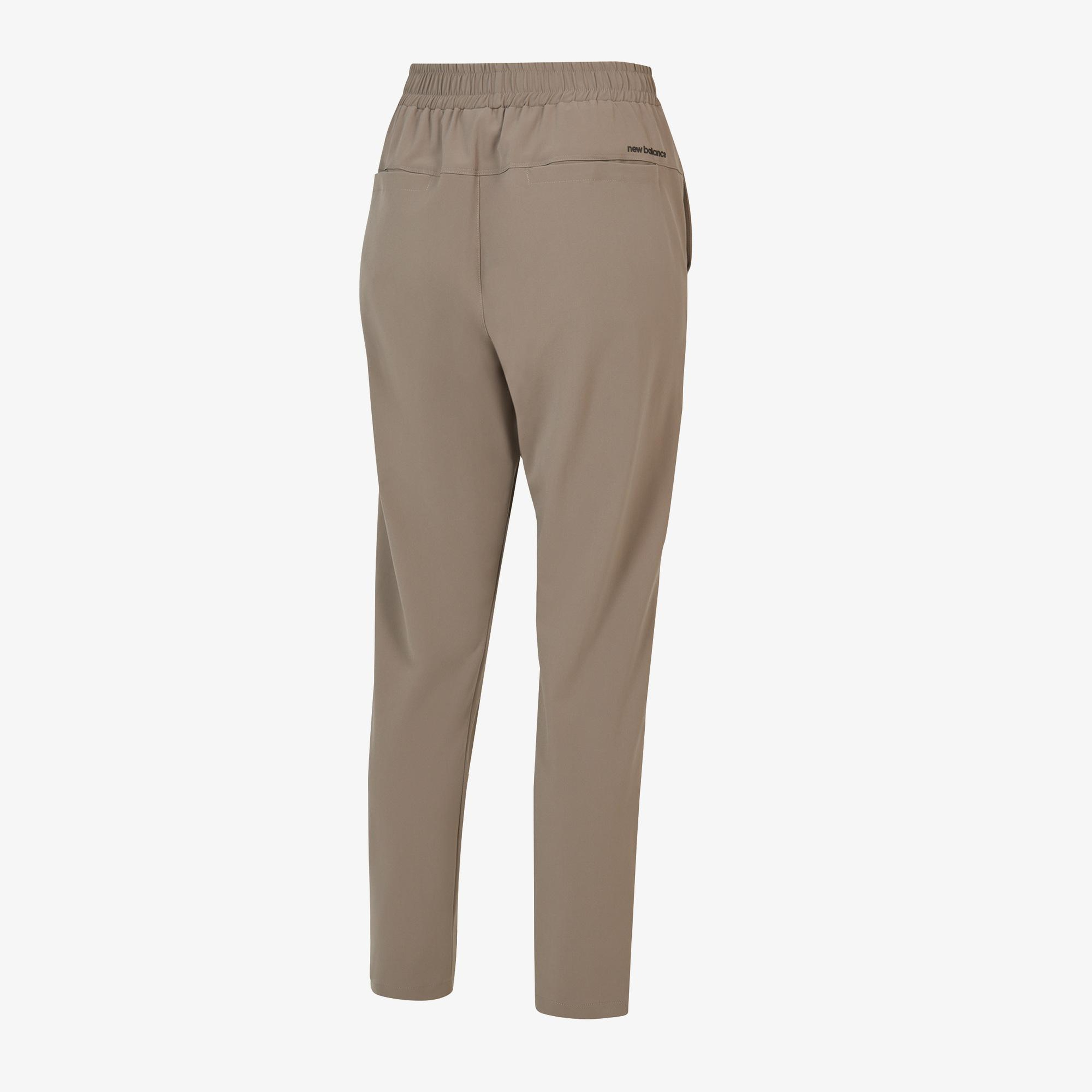 New Balance MNP3433 Lifestyle Erkek Bej Eşofman Altı